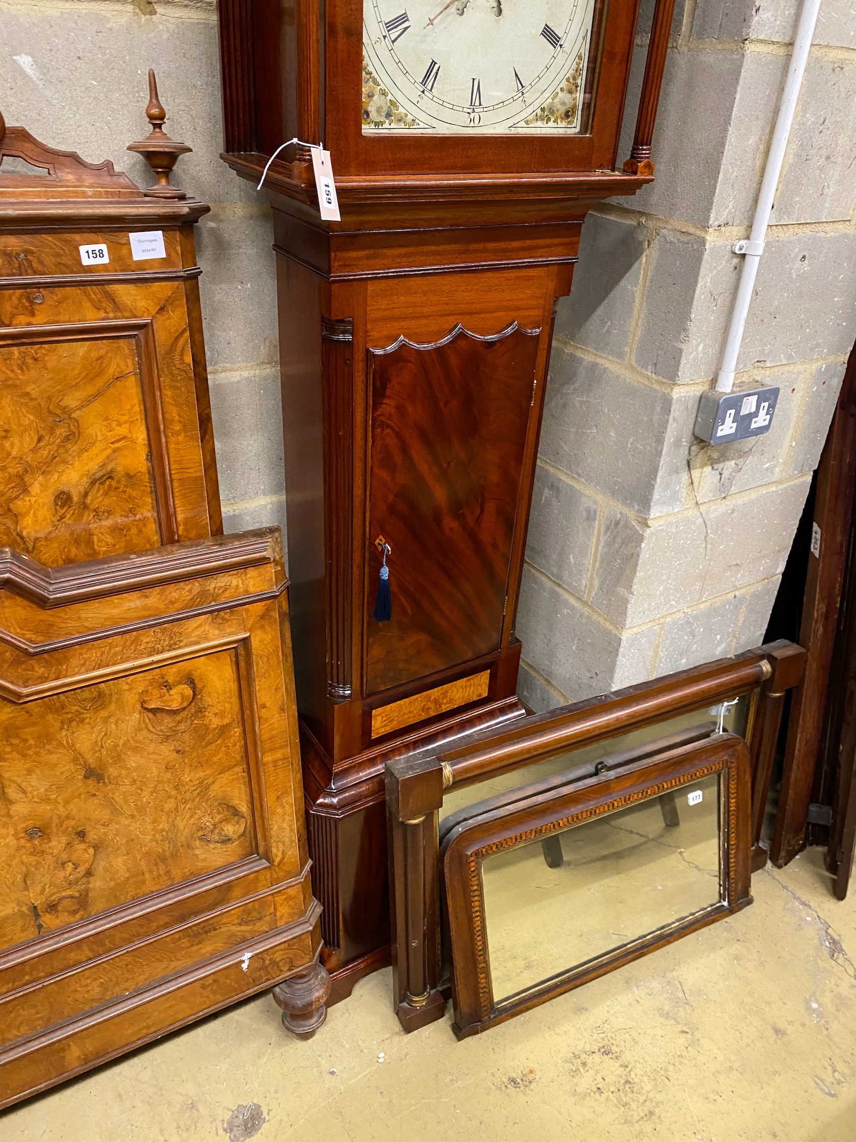 An early 19th century mahogany eight day longcase clock with painted arched dial, height 218cm